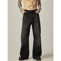 Black straight leg jeans with loose retro styling and basic zip fly design