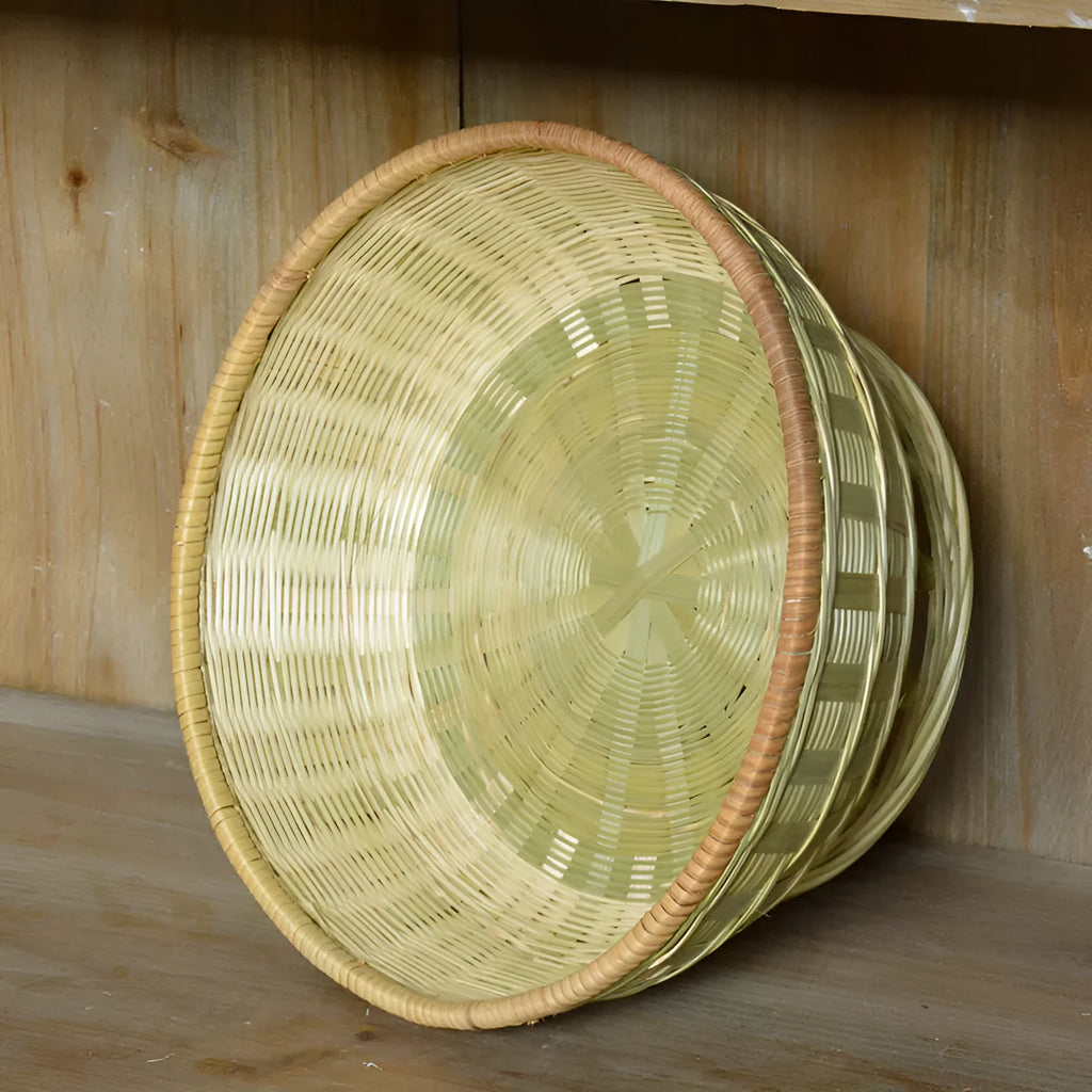 Handmade bamboo storage basket in woven construction showing three size options