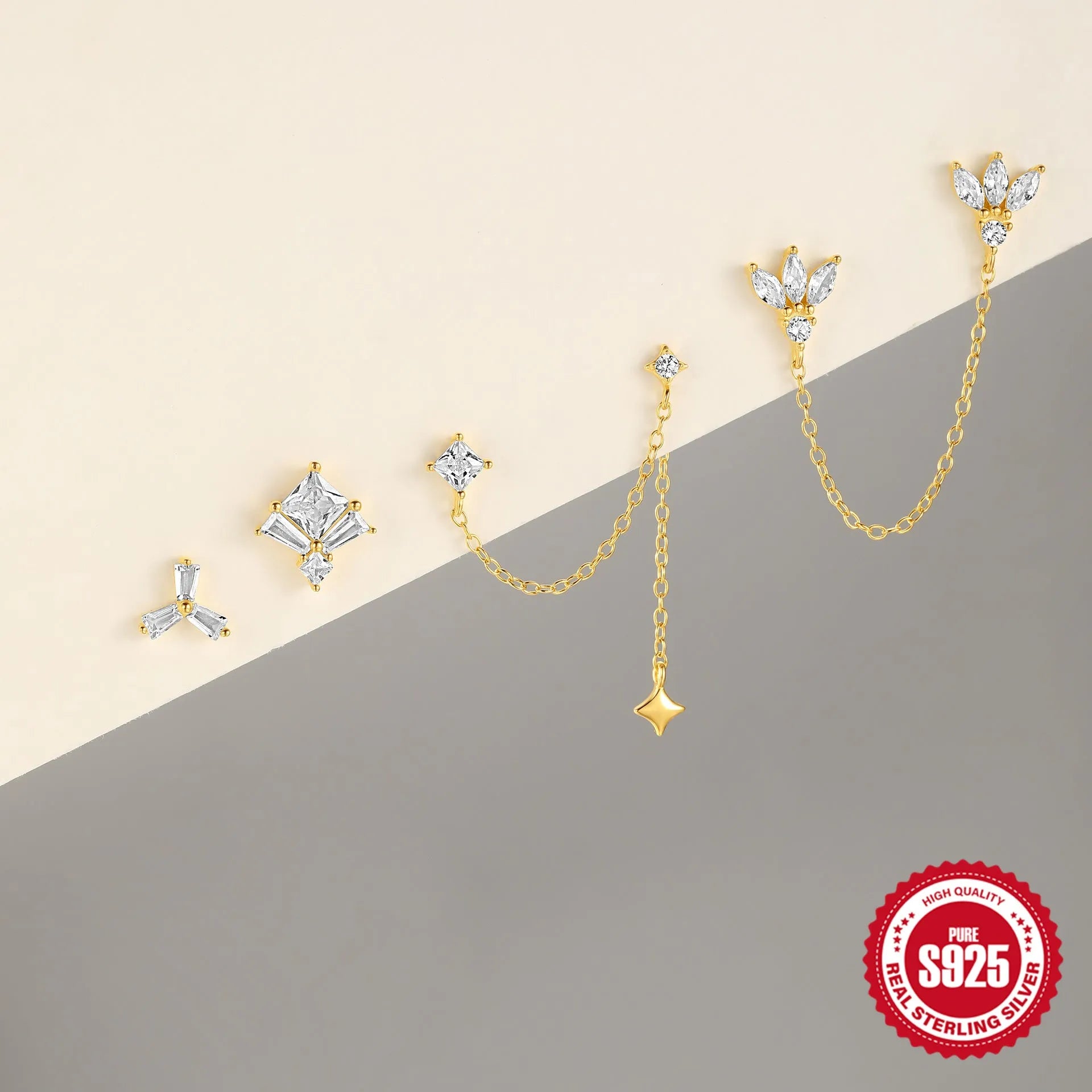 S925 sterling silver stud earrings with zircon stones and chain design for double piercing in golden colour
