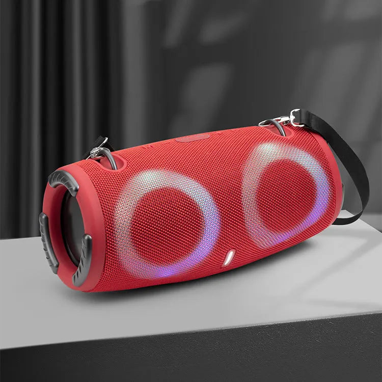 War Drum portable Bluetooth speaker with RGB coloured lights in outdoor setting