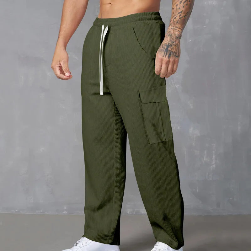 Men's straight-leg corduroy cargo trousers in brick red with a drawstring waist