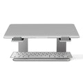 Aluminium alloy laptop stand in black or silver measuring 29.9 x 25.8 x 18.5 cm on a desk