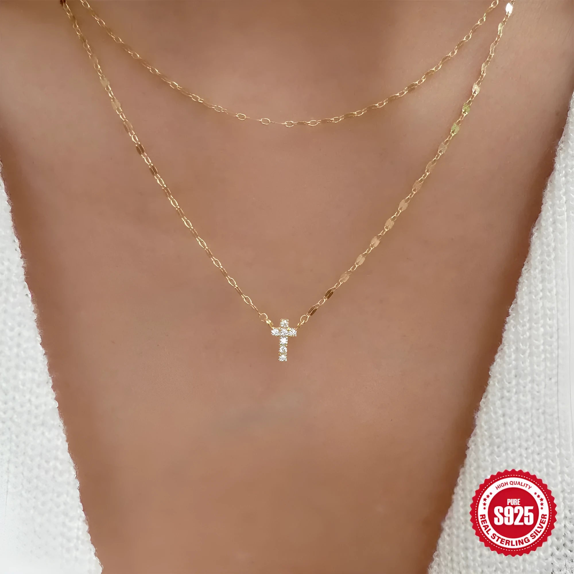 S925 sterling silver double layer twin diamond cross pendant necklace on a clavicle chain, shown in gold and white gold colour finishes.
