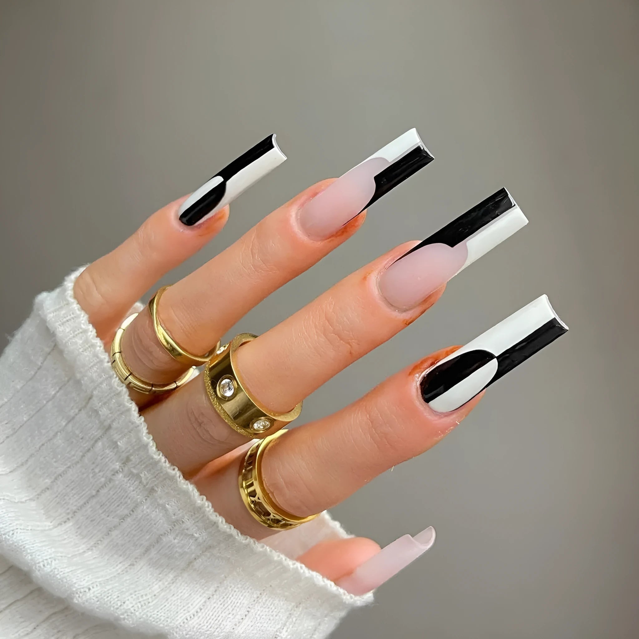 24 long removable nail tips in simple black and white colour matching design JP1199 on a white background