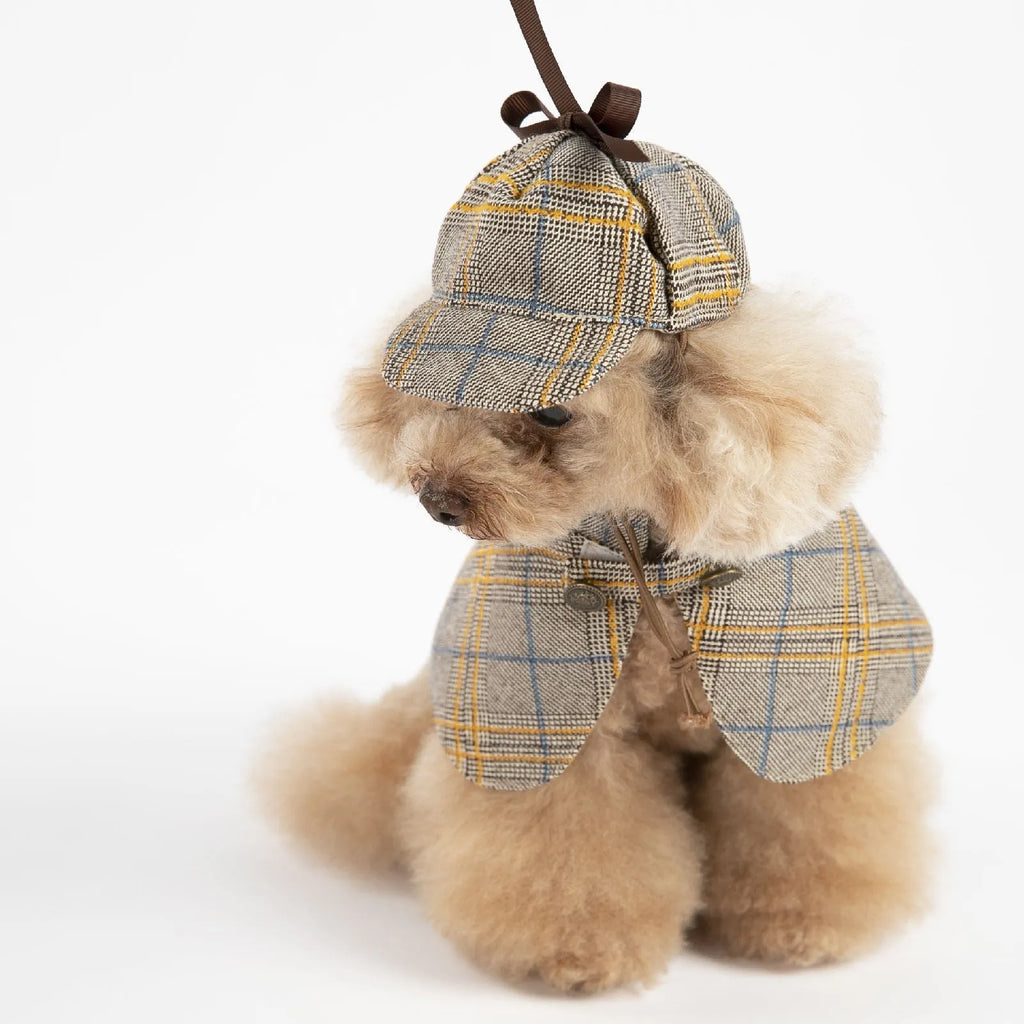 Camel coloured cotton pet cloak with adjustable hat showing six size options for dogs