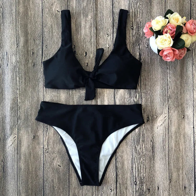 Solid colour bikini set in polyester fabric on a white background.