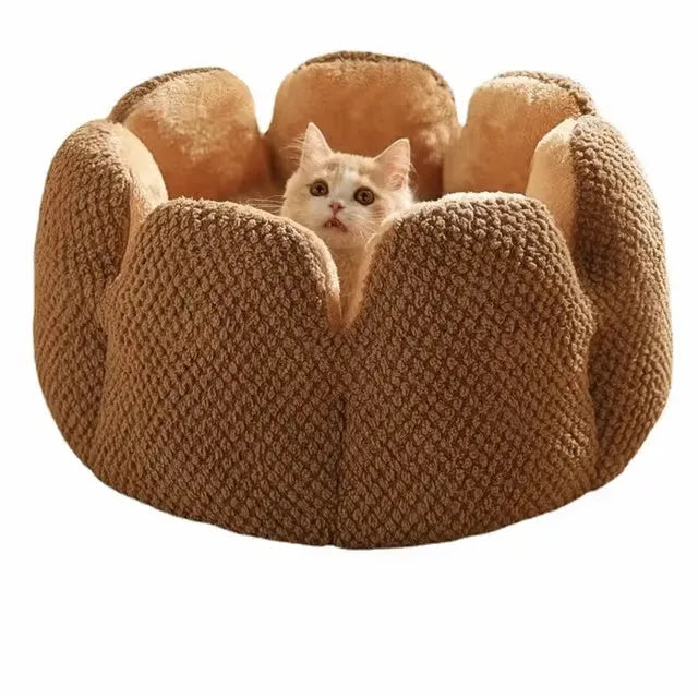 Green cactus petal shape plush kennel bed for cats and small dogs on a hardwood floor.