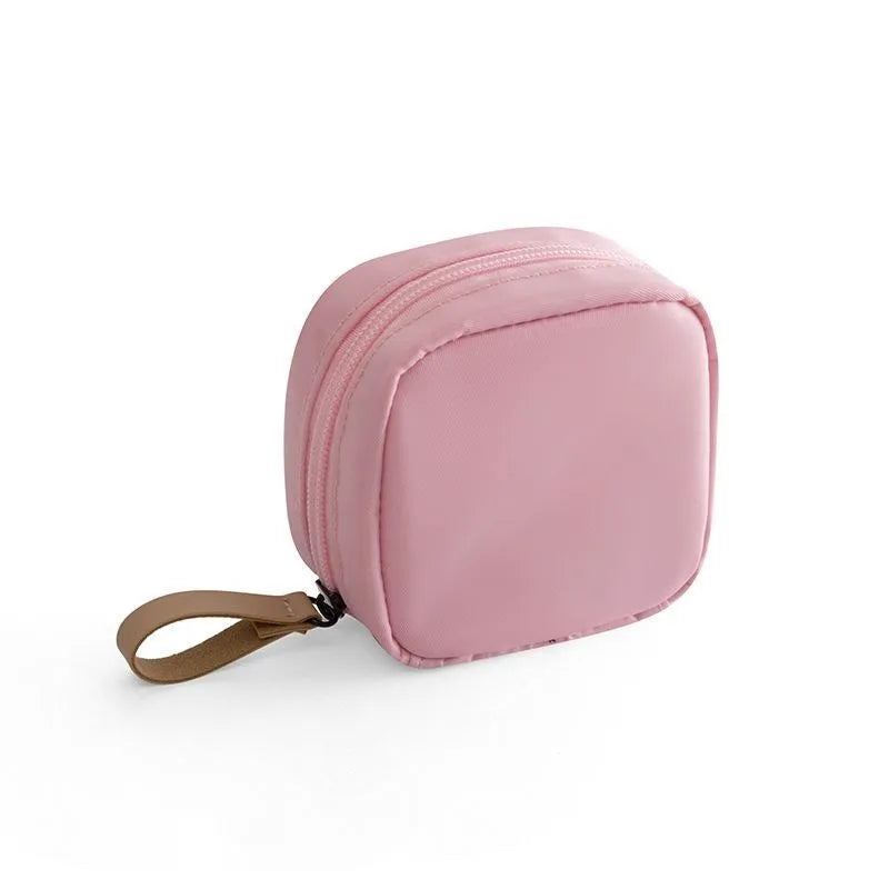 Cloth cube makeup storage bag with plain design in blue, pink, white, and white pink colour options