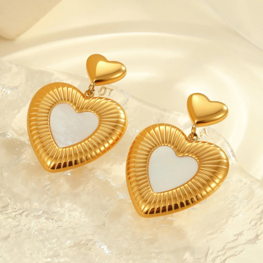 Gold heart-shaped stainless steel earrings with 18K electroplated finish for women's fashion wear