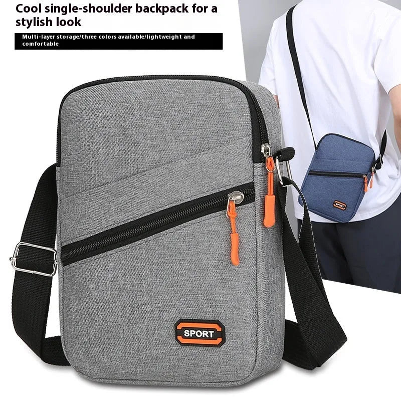 Oxford cloth commuter bag in black, navy blue, or silver grey with contrasting details