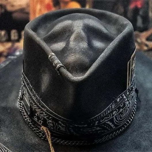 Handmade wool felt skull hat with a conical crown on a model, shown in the skull hat colour variant.