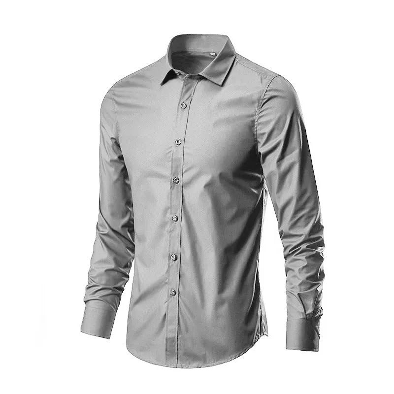 Men's loose-fit long-sleeve linen shirt shown in a neutral colour, featuring a button front and long sleeves.