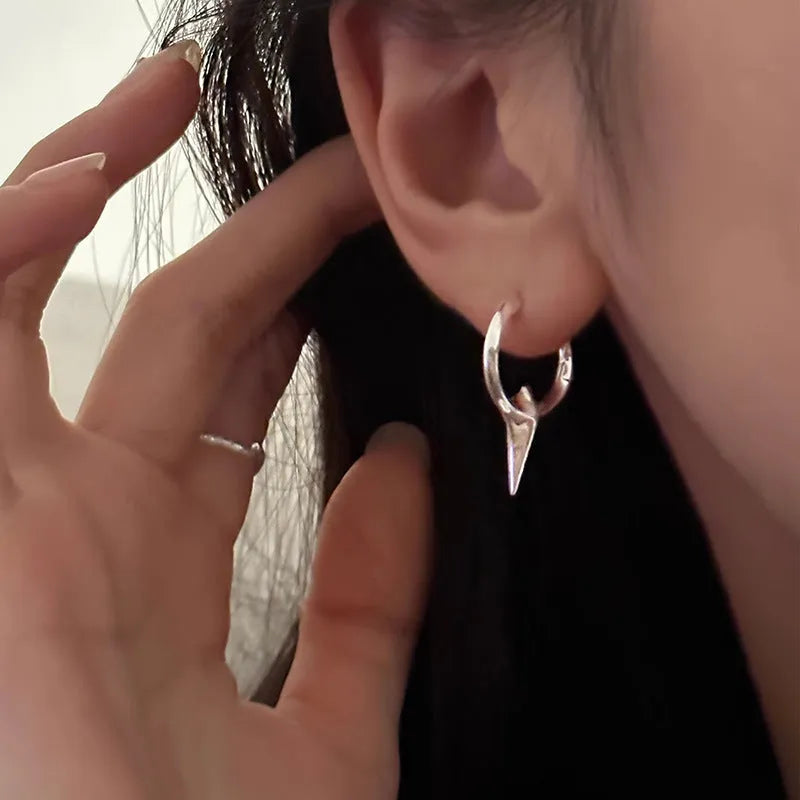 Geometric star shaped women's ear clips with electroplated copper white gold finish in platinum colour