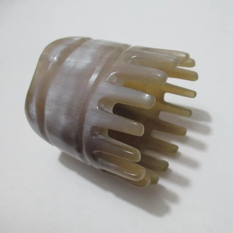 Black buffalo horn meridian massage comb with wide tooth design for scalp stimulation