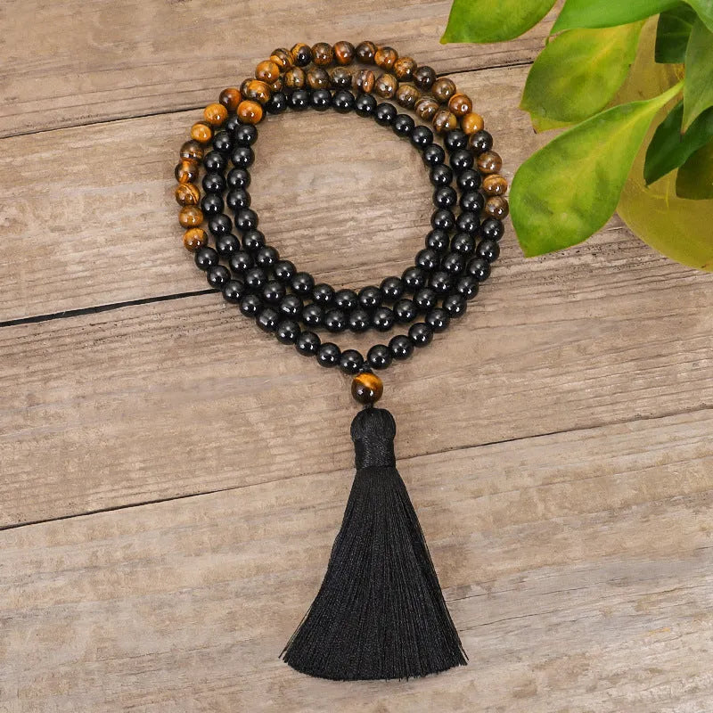 Tiger eye stone drop pendant necklace with tassel detailing on 81cm adjustable chain