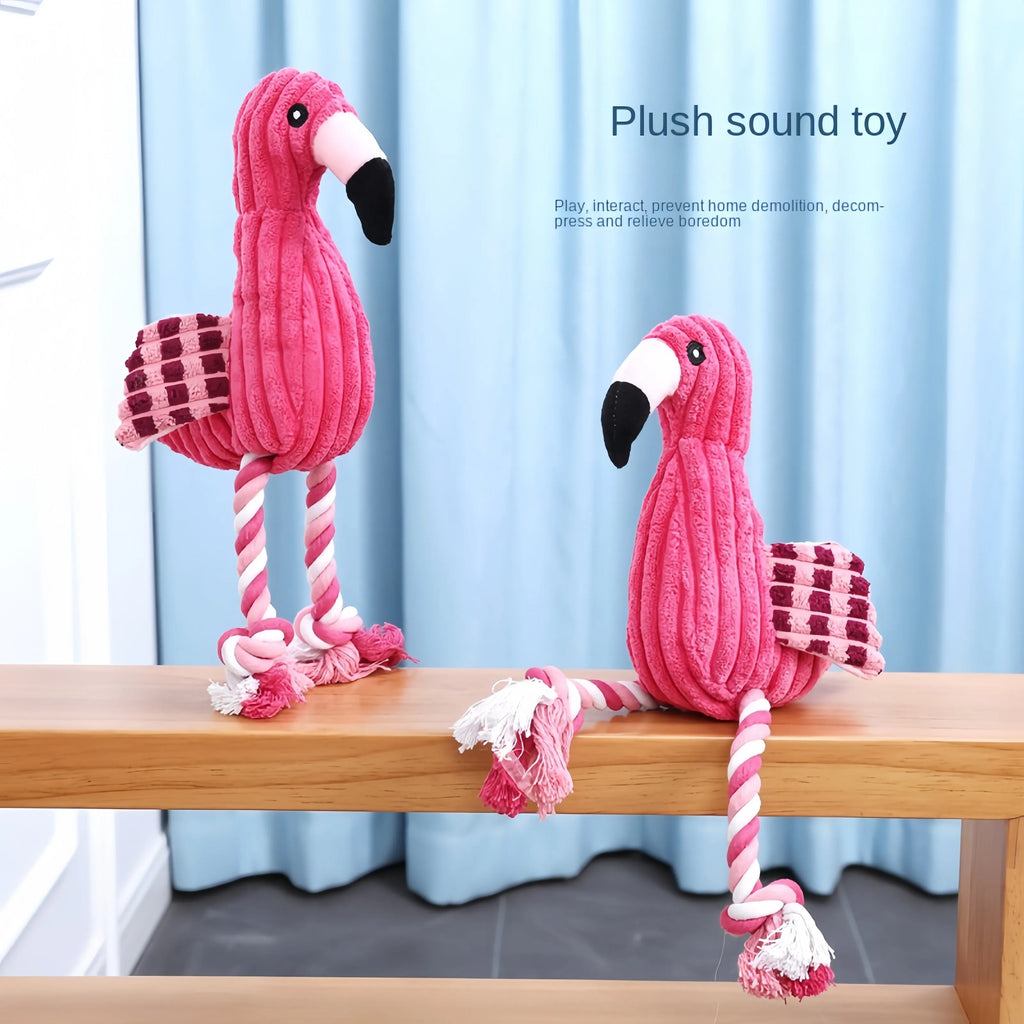 Pink animal-shaped corduroy plush dog toy with a squeaker inside