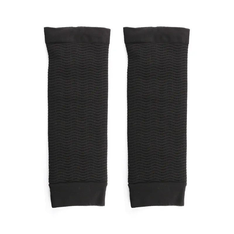 Women's black and skin-tone shaping arm sleeves made from nylon fabric, free size.