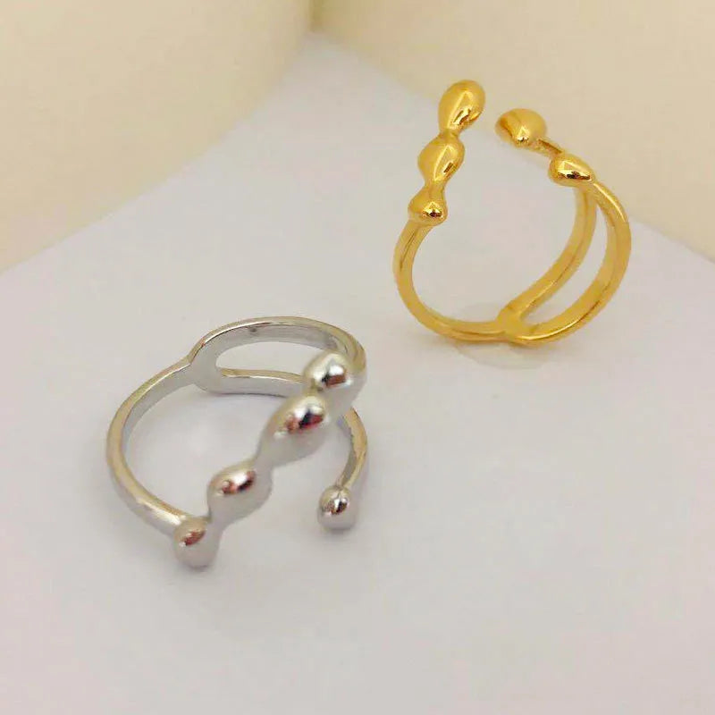 Gold or silver plated brass opening ring with circular sphere design for women