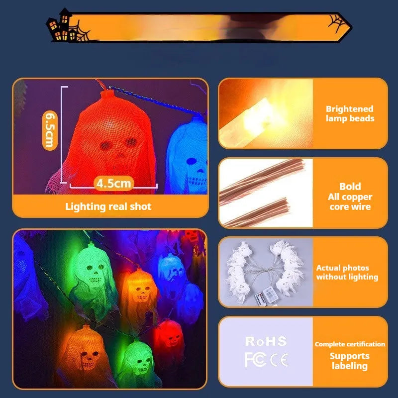Halloween battery-powered coloured LED string lights on a plastic spool with battery box, options for 1.5m or 2.5m length.