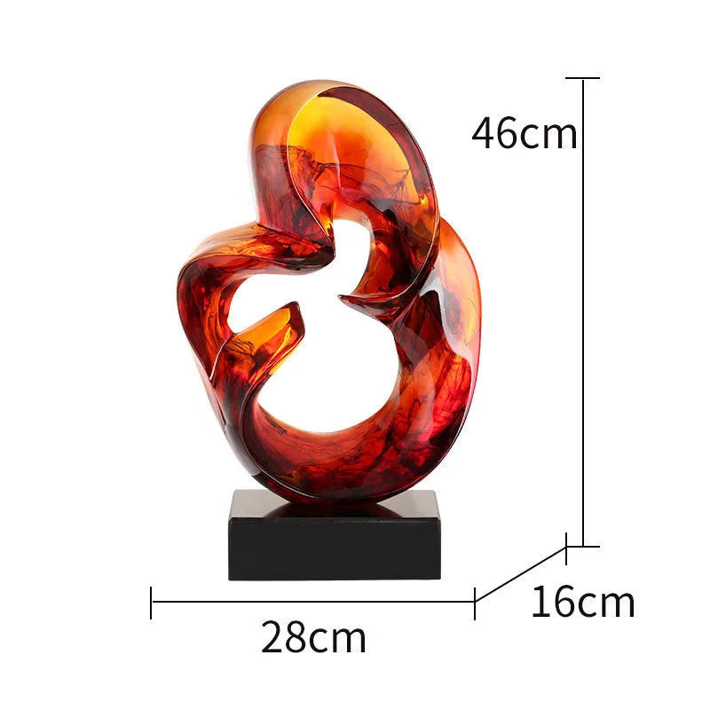 Transparent resin ornament with polished surface in blue colour on shelf