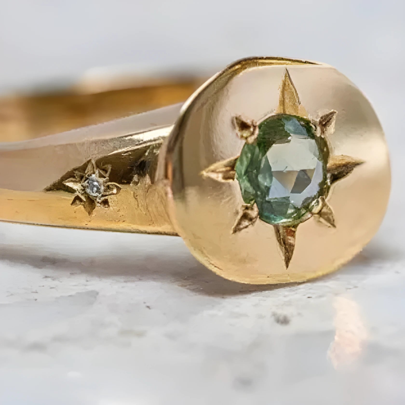 Golden adjustable ring with star design and oval asterism zircon pattern
