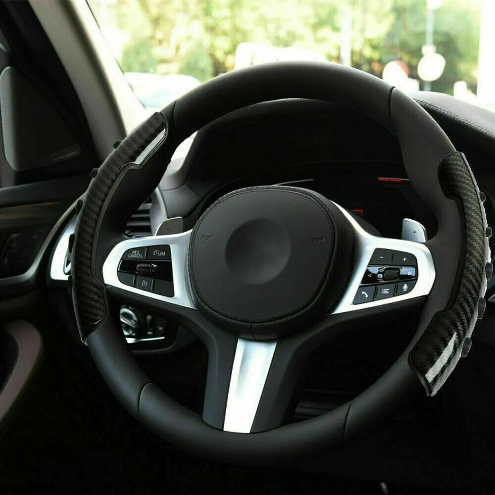 Carbon fibre black steering wheel anti-skid sleeve showing textured fibre surface and 38cm diameter measurement