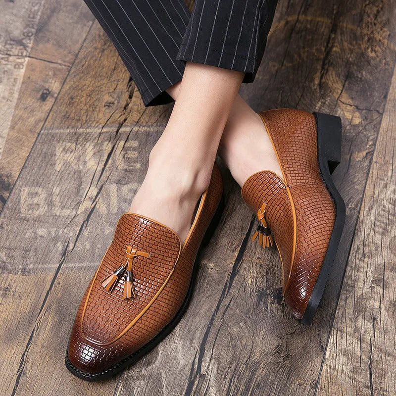 Men's black pointed toe slip-on business shoes with decorative tassel on artificial PU upper