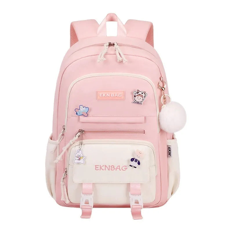 Pink waterproof Oxford cloth school backpack for girls with curved shoulder straps on a white background.