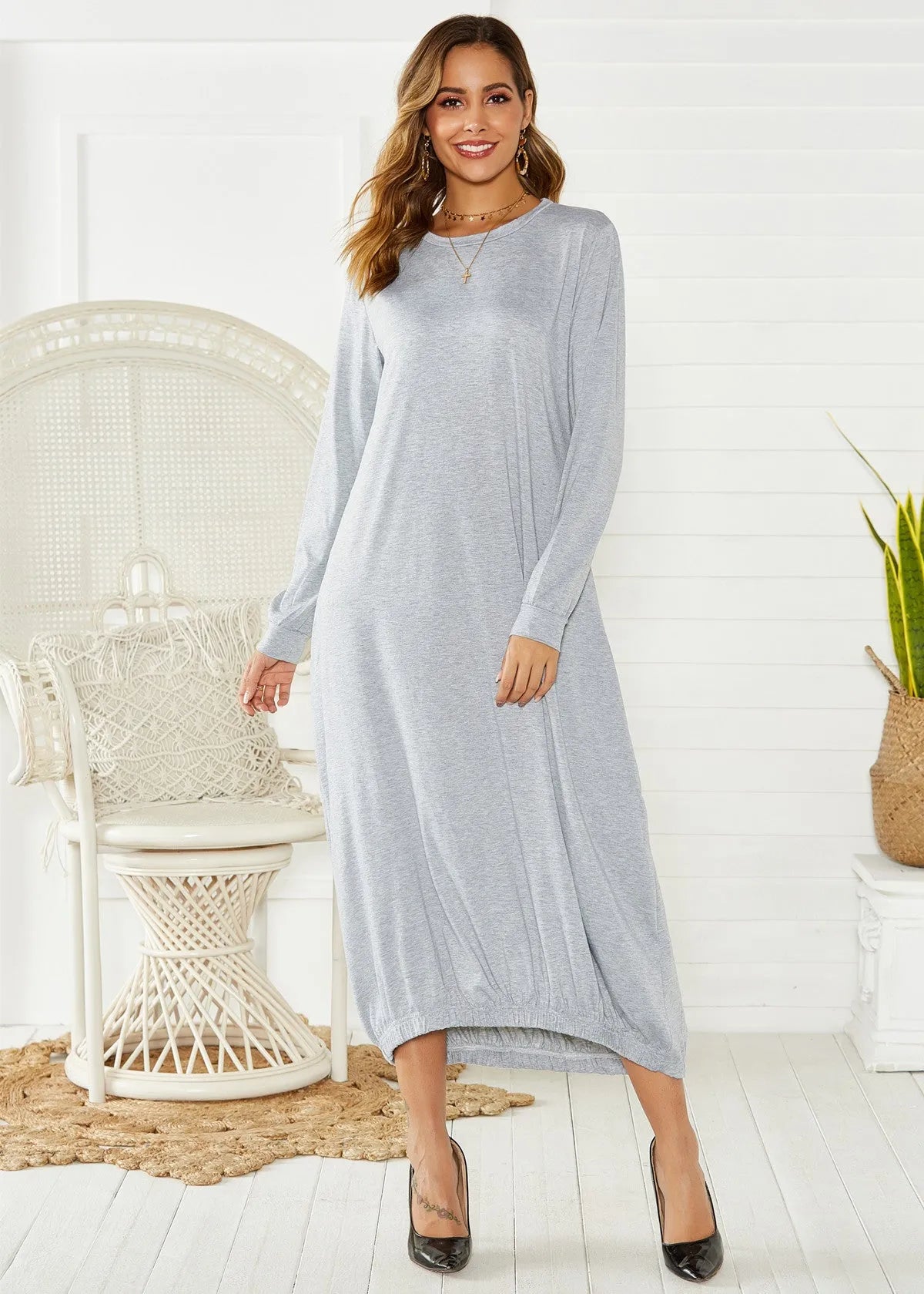 Black lantern dress with lace-up crew neck and loose silhouette for casual wear