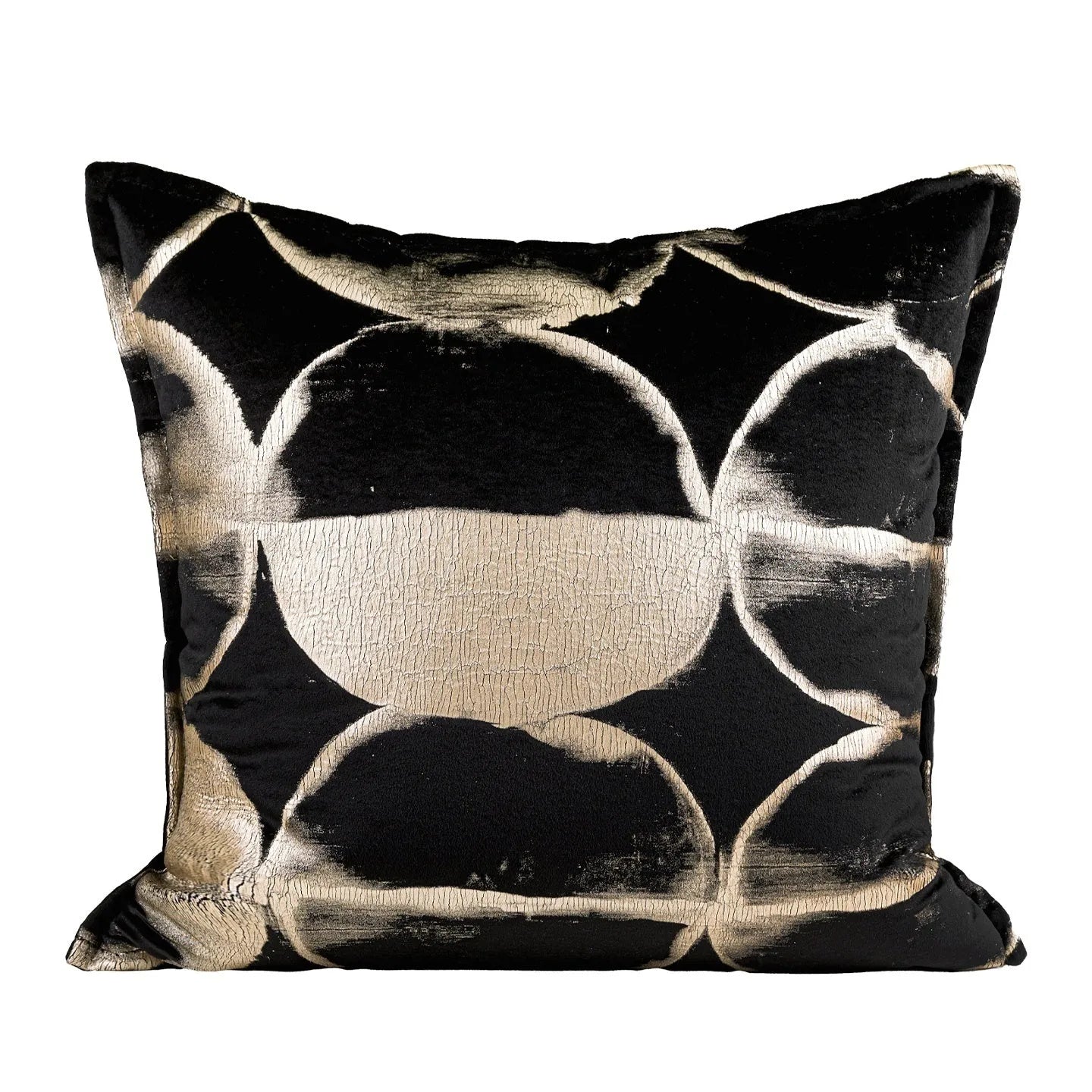 Black gold abstract pattern decorative flannel cushion on a sofa, showing removable cover.