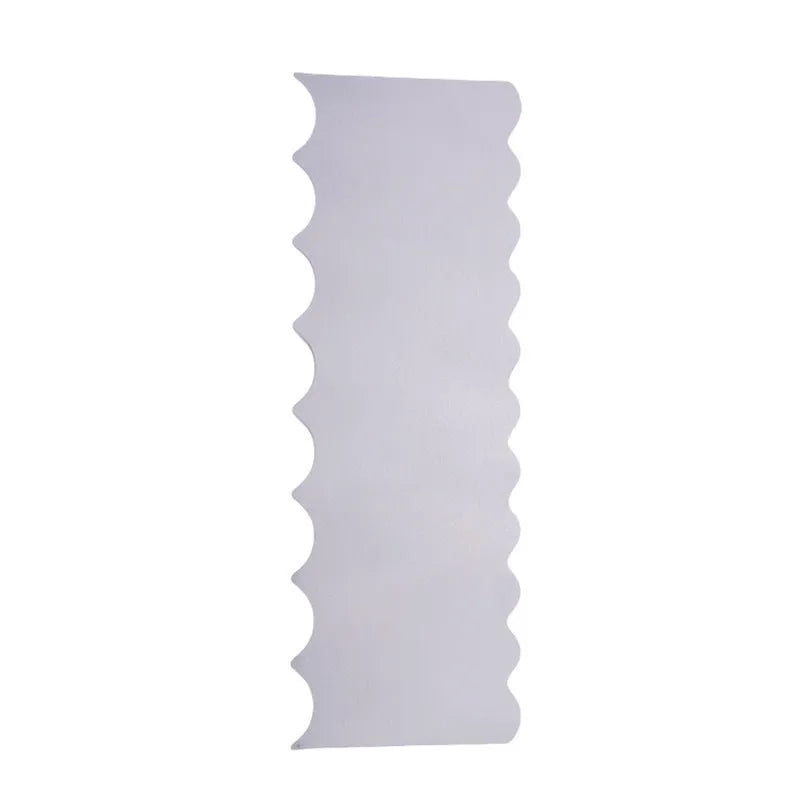 Stainless steel cake scraper with a polygon patterned blade for icing and filling work.