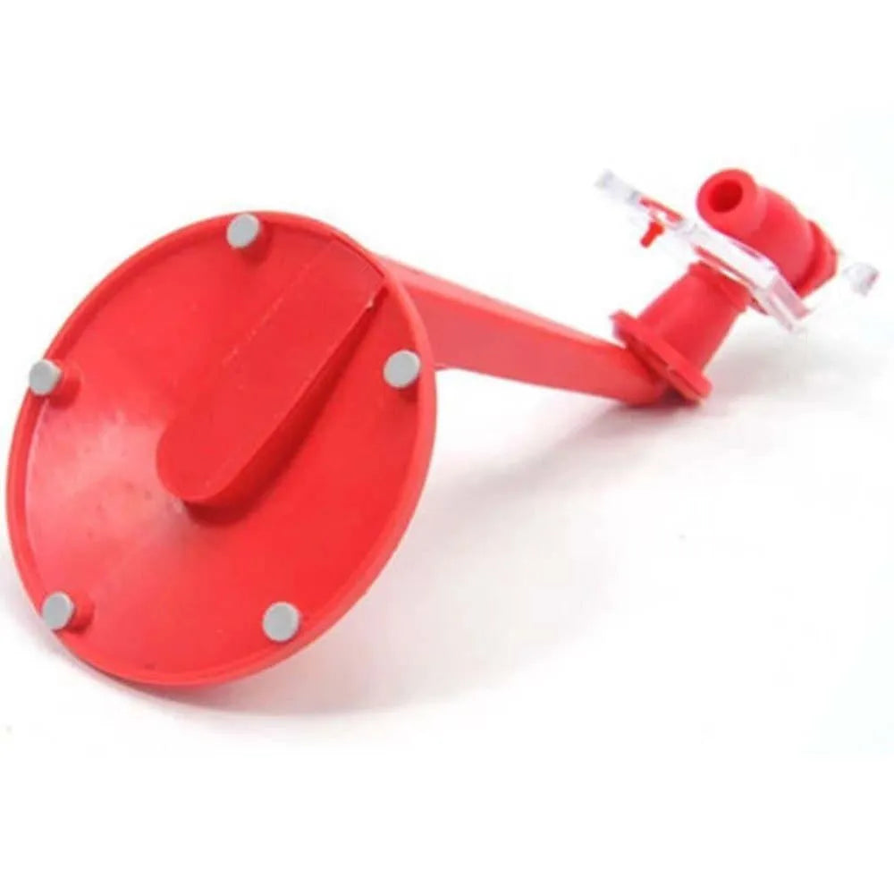 Red plastic Magic Tap soda dispenser attached to inverted 2-litre bottle