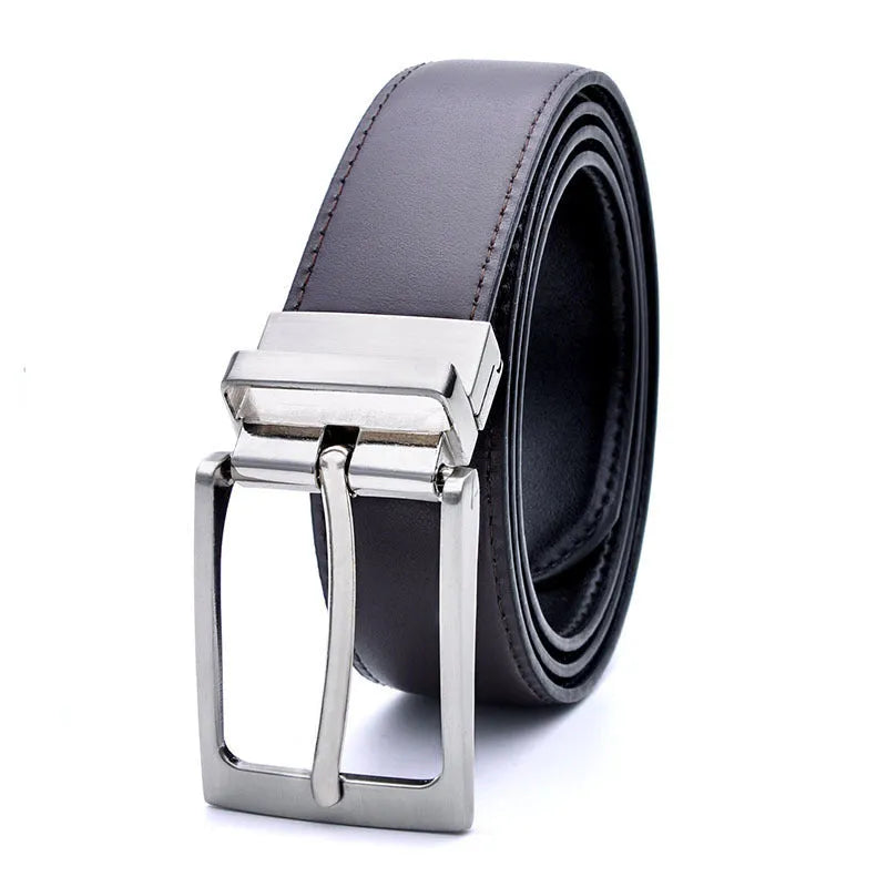 Men's brown and black genuine leather belt with a silver rotating pin buckle, shown on a flat surface.