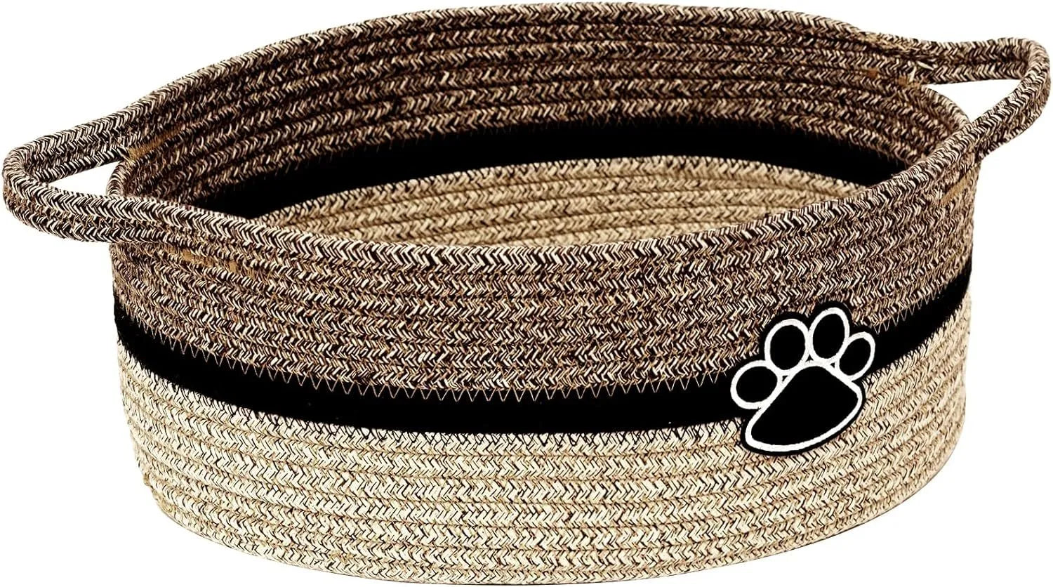 Light beige handmade woven cotton rope storage basket with wooden base and handle on a table.
