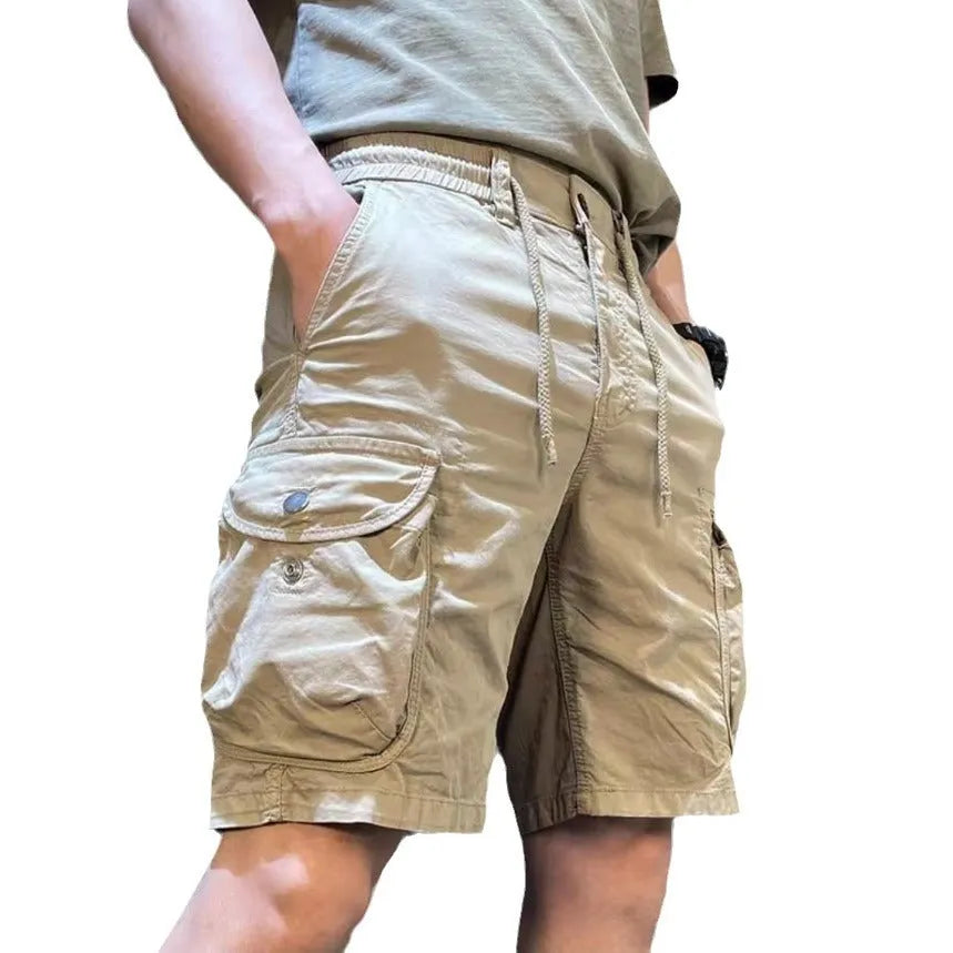 Korean style loose straight-leg casual overalls pants with multiple pockets in black.