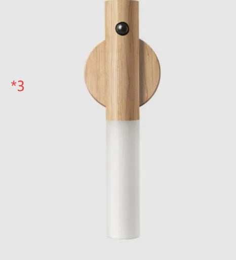 Smart sensor LED desk lamp in wood and acrylic glass on a desk.
