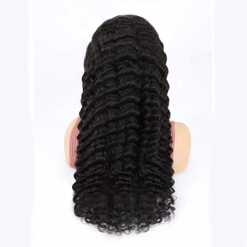 A solid colour human hair half lace wig displayed on a stand, showing its natural-looking hairline and long, straight style.