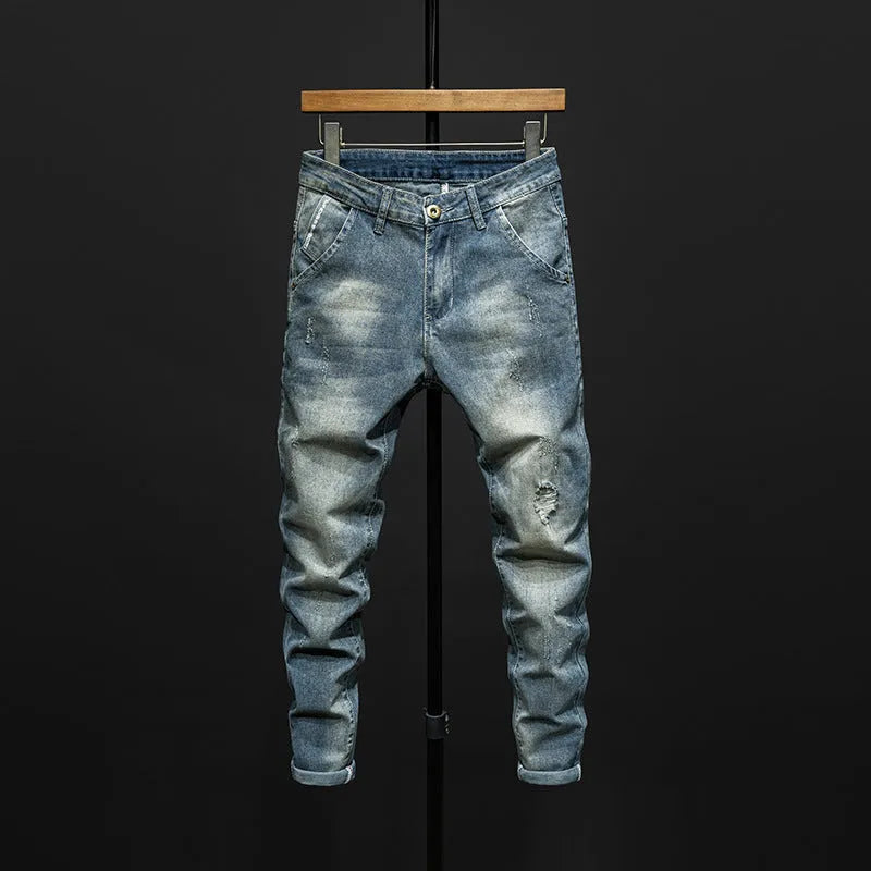 Men's slim-fitting skinny jeans in dark blue cotton denim with micro elasticity.