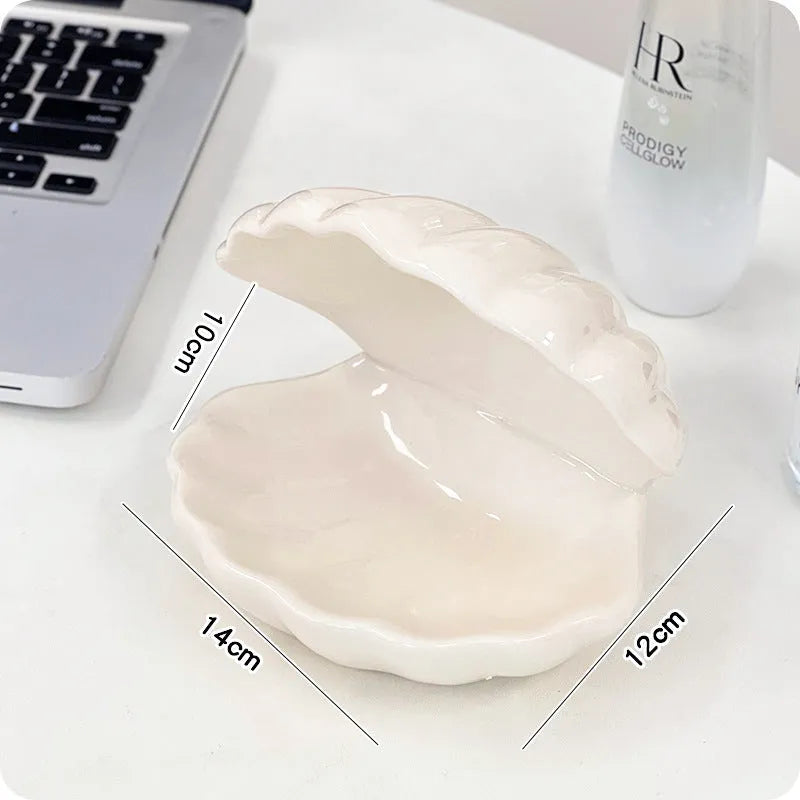 White porcelain storage tray with small night lamp in modern minimalist design