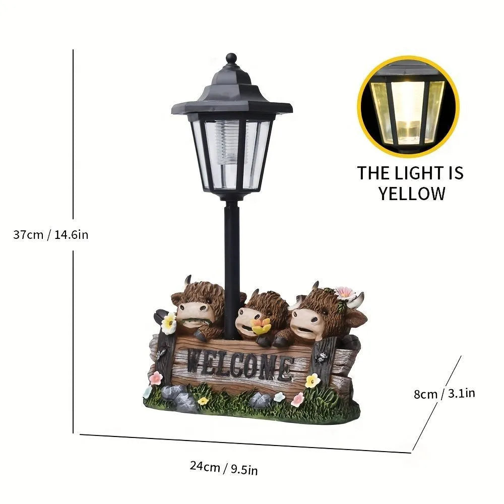Solar hexagonal garden lamp with decorative resin figurine on plastic base for outdoor pathway lighting