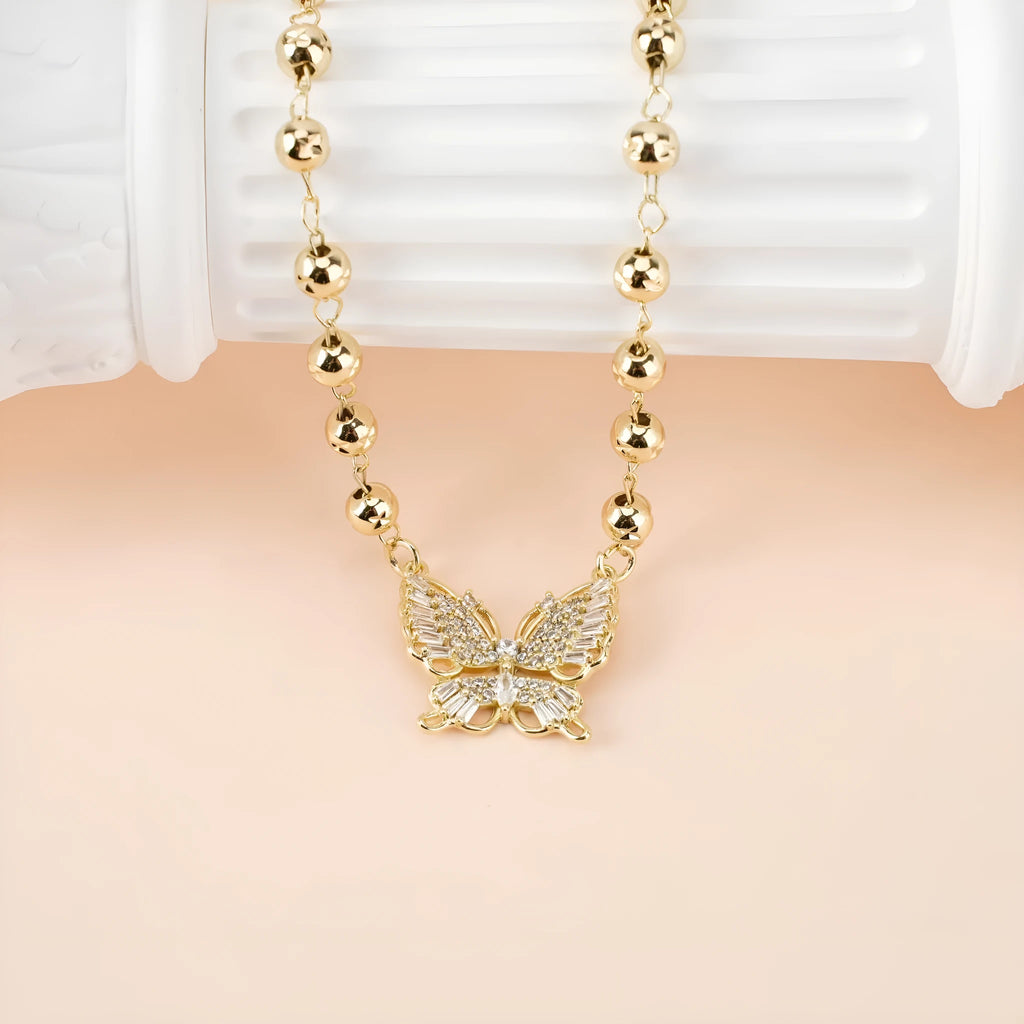Gold butterfly necklace with zircon inlay on adjustable stainless steel chain, simple bow design for women