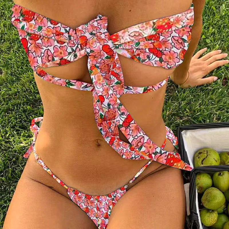 Women's lace-up front swimsuit with floral print and chest pad support