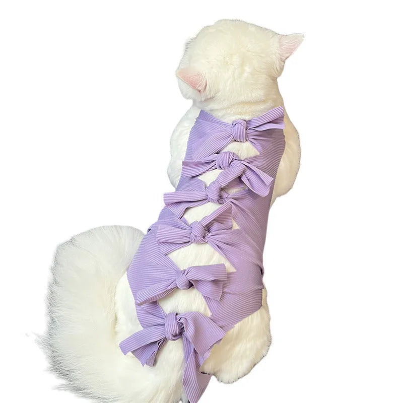 Adjustable lace-up cat sterilisation recovery suit in polyester, shown in various colours.