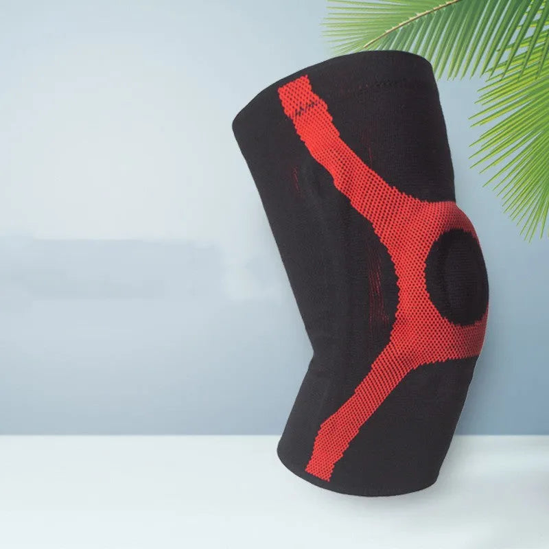 Silicone sports kneecap in red, showing knitted non-slip design for knee protection.