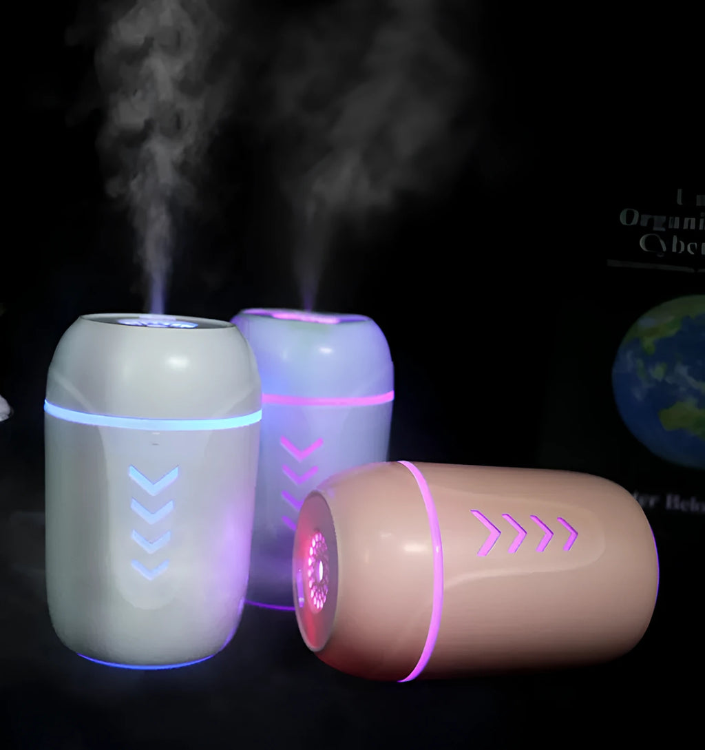 X3 portable car humidifier in columnar shape, shown in blue, pink, and white colour options.