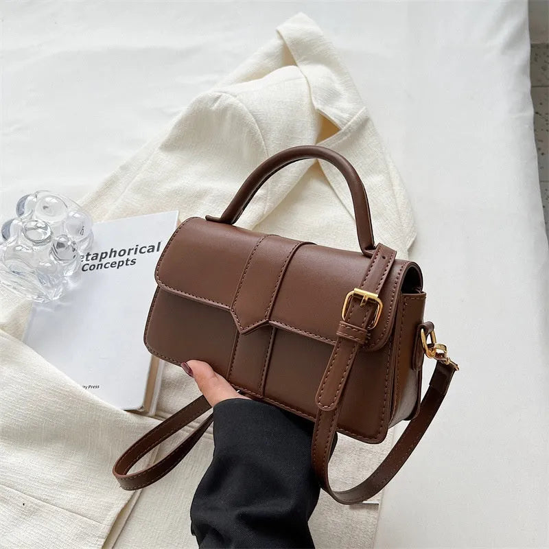 Women's PU leather messenger bag in horizontal square shape with file organisation and sandwich pocket