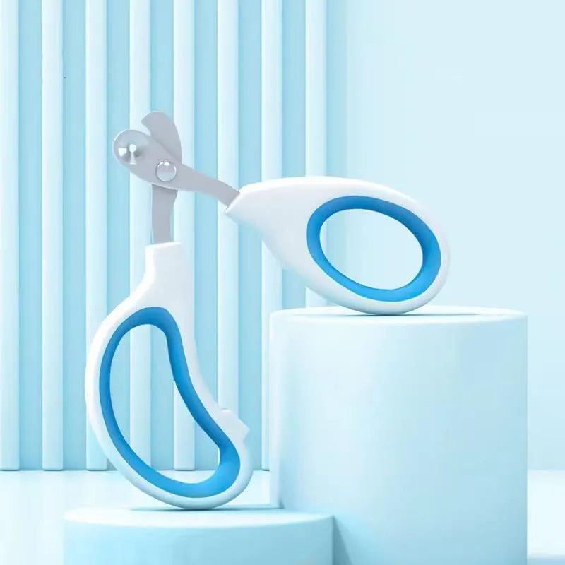Blue cat nail clippers with a circular guide hole and non-slip handle on a white background.