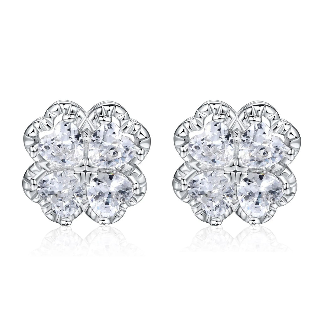 Pair of heart-shaped sterling silver stud earrings with a four-leaf clover design and a central zircon stone.