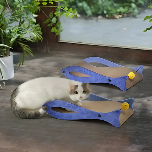 Blue fish-shaped cardboard cat scratcher with a wavy lounging area and a hanging bell ball toy.