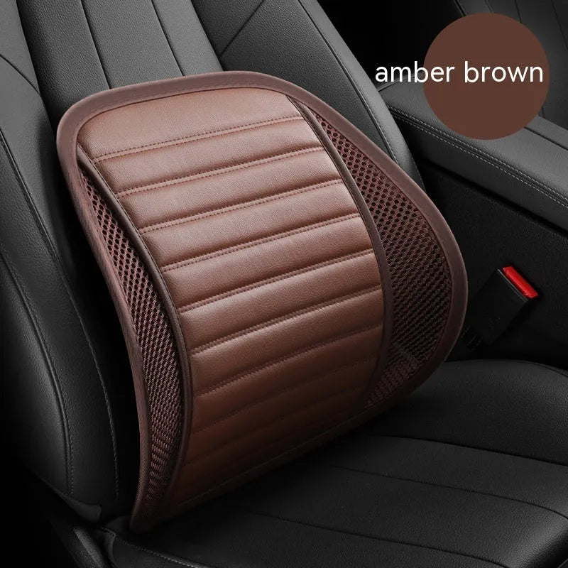 Leather lumbar support cushion on a car seat, shown in sapphire blue colour.